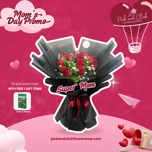 Bouquet of local red roses, asters, and rosal in black wrap and black net with freebie — a bold and heartfelt gift for a super mom