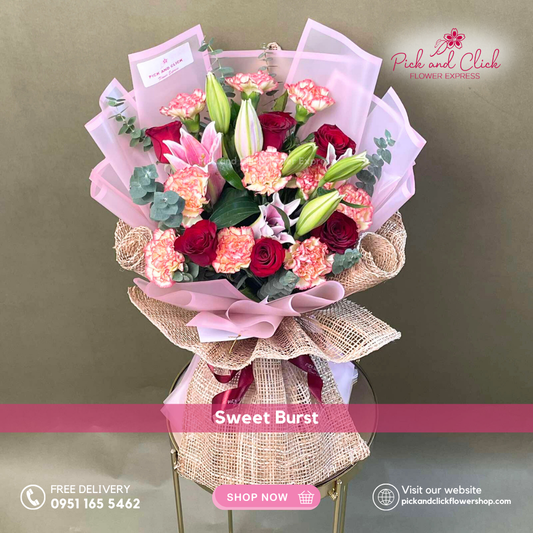 Bouquet of flowers with decorative paper and ribbons on a stand, branded 'Pick and Click Flower Express'.