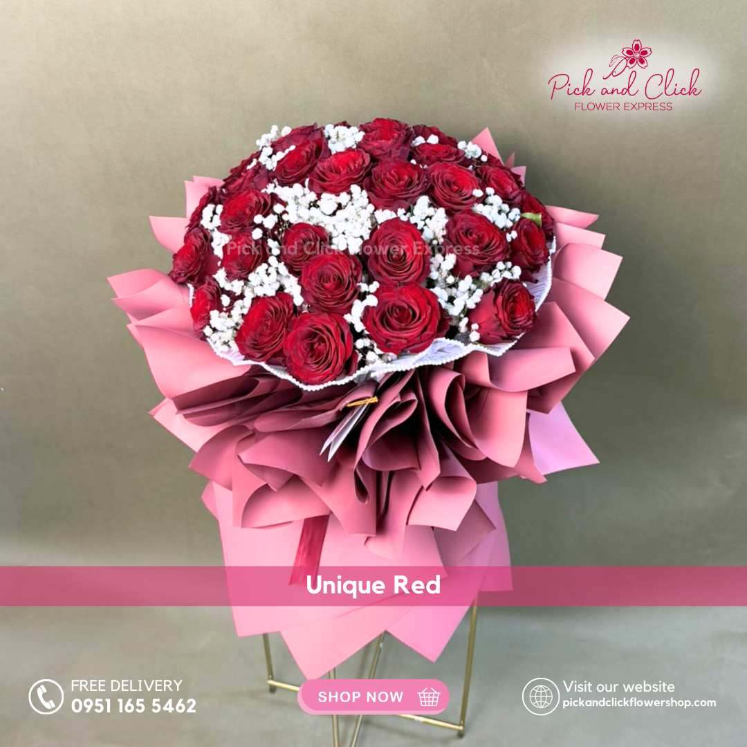 Bouquet of imported red roses with white gypsophila (baby’s breath), elegantly arranged