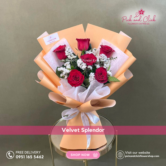 Velvet Splendor bouquet featuring six imported red roses with white statice arranged in a classic romantic hand bouquet.